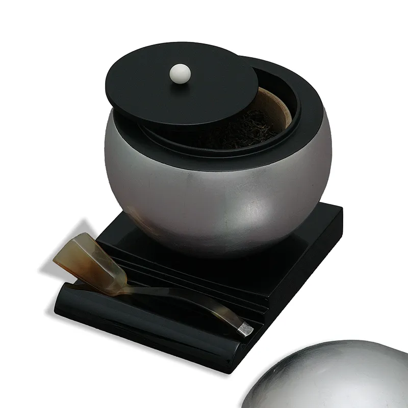 Hộp trà tròn bạc